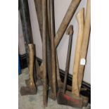 A PAIR OF ACRO PROPS, together with various axes, sledge hammer , pry bars, and road picks