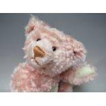 A STEIFF LIMITED EDITION 'TEDDY BEAR ROSE 38' MOHAIR BEAR, button in ear, white tag 654480, number