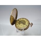 A CONTINENTAL 14K GOLD CASED MANUAL WIND FULL HUNTER POCKET WATCH BY PERRET & FILS -