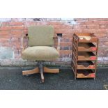 A VINTAGE OAK OFFICE SWIVEL ARMCHAIR, together with a vintage oak five tray open file drawer (2)