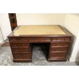 A NINETEENTH CENTURY MAHOGANY TWIN PEDESTAL DESK, having an inset leather surface above an