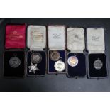 A COLLECTION OF SEVEN VARIOUS SWIMMING MEDALS, to include a hallmarked silver Staffordshire Swimming