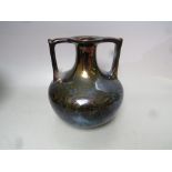 A ROYAL LANCASTRIAN LUSTRE TWIN HANDLED VASE, printed marks to base, H 17.5 cm,