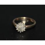 A HALLMARKED 9 CARAT GOLD DIAMOND CLUSTER RING, approx weight 2.4g, ring size J
