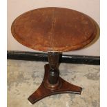 A NINETEENTH CENTURY CARVED PEDESTAL TABLE, on ceramic bun feet, Dia.. 61 cm, H 72 cm