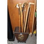EIGHT ASSORTED WOODEN WALKING STICKS, to include a hallmarked silver banded ebonised example,