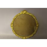 A SMALL CIRCULAR GOLD FRAME, width of frame 2 cm (average), rebate 21 cm diameter