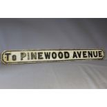 A VINTAGE CAST METAL STREET SIGN 'TO PINEWOOD AVENUE', W 147 cm