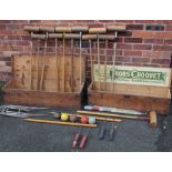 A VINTAGE PINE CASED JACQUES OF LONDON PART CROQUET SET, together with a vintage Slazenger 'Thors