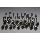 A MATCHED SET OF FIFTEEN HALLMARKED SILVER FIDDLE AND THREAD DESSERT SPOONS BY CHAWNER & CO (