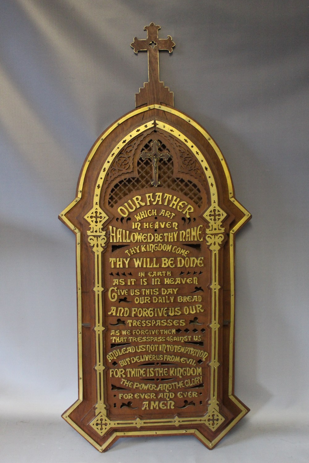 A TWENTIETH CENTURY ECCLESIASTICAL 'THE LORDS PRAYER' WALL HANGING PRAYER, the raised carved verse