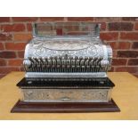 A BRASS CASED MODEL 45 NATIONAL CASH REGISTER WITH NICKEL CHROME FINISH circa 1899, ornate decorated