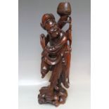 A CARVED HARDWOOD EASTERN FIGURE, H 51 cm