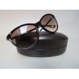 A PAIR OF MICHAEL KORS 'CAMILA' SUNGLASSES, M28355, with rigid case and cleaning cloth