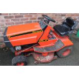 A WESTWOOD T1200 RIDE-ON LAWN TRACTOR WITH A REAR BOX