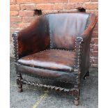 A VINTAGE STUDDED LEATHER TUB CHAIR, with barley twist foot rail, W 68 cm, D 72 cm, H 70 cm