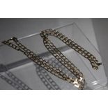 A HALLMARKED ITALIAN GOLD FLAT LINK CHAIN, additional 375 marks to clasp, approx length 60 cm,