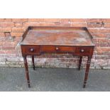 A 19TH CENTURY MAHOGANY TRAY TOP WASHSTAND, having three frieze drawers, raised on turned