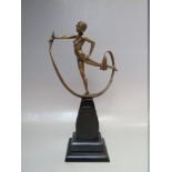 A COALPORT 'SPELLBOUND' ART DECO STYLE FIGURE, bronzed effect nude dancer, raised on a stylised