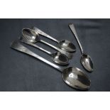 A COLLECTION OF FIVE BRIGHT CUT SPOONS, various dates and makers to include a table spoon by