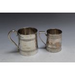 TWO HALLMARKED SILVER CHRISTENING TANKARDS, the larger being Sheffield 1908 and the smaller one