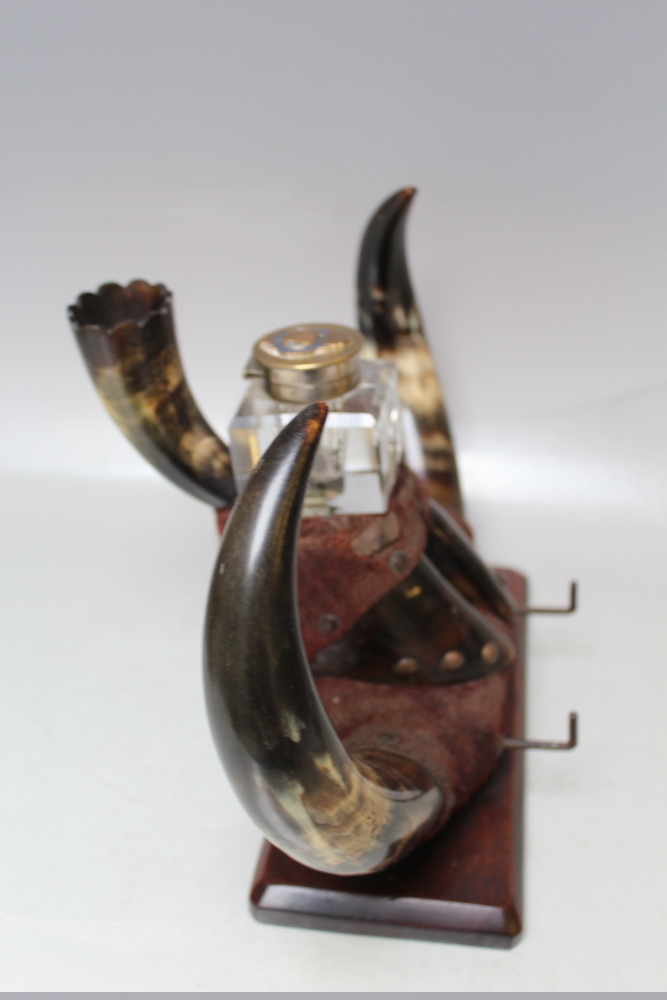 A 19TH CENTURY HORN / HOOF INKSTANDISH, having central glass square inkwell, raised on a mahogany - Image 3 of 3