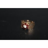 A HALLMARKED 9 CARAT GOLD GARNET DRESS RING, approx weight 4.1g, ring size Q