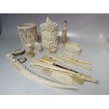 A COLLECTION OF EARLY TWENTIETH CENTURY IVORY AND BONE, to include two carved tusk cases, Japanese