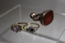 AN UNMARKED YELLOW METAL AND CARNELIAN FOB SEAL, together with an 18ct gold ladies dress ring for