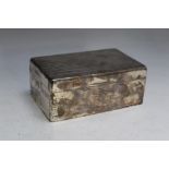 A HALLMARKED SILVER CIGARETTE BOX BY WILLIAM NEALE & CO LTD - BIRMINGHAM 1929, with presentation