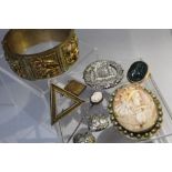 A COLLECTION OF VINTAGE COSTUME JEWELLERY, to include an oriental type bangle with repoussé style
