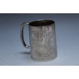 A HALLMARKED SILVER MUG BY ATKIN BROS - SHEFFIELD 1897, with floral swags creating a vacant