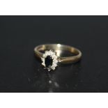 A HALLMARKED 9 CARAT GOLD SAPPHIRE AND DIAMOND RING, approx weight 1.9g, ring size N 1/2
