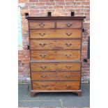 A 19TH CENTURY MAHOGANY TALLBOY, having two short above three longer graduated drawers and three