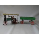 A VINTAGE MAMOD STEAM TRACTION ENGINE WITH TRAILER