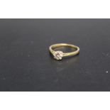 AN 18CT BRILLIANT CUT DIAMOND SOLITAIRE RING, of an estimated quarter carat, approx weight 1.9g,