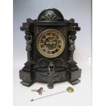 A LARGE VICTORIAN BLACK SLATE AND BRONZE FIGURAL MANTLE CLOCK, having a bow fronted base with bronze