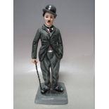 A ROYAL DOULTON LIMITED EDITION CHARLIE CHAPLIN FIGURE - HN2771, number 1352 of 5000, H 22.5 cm