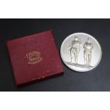 NATIONAL RIFLE ASSOCIATION - A CENTENARY COMMEMORATIVE MEDALLION, unmarked white metal, approx