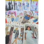 A LARGE COLLECTION OF VINTAGE SEWING PATTERNS, mostly McCalls, various styles and periods (approx