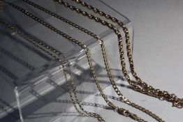 TWO 9CT GOLD CHAIN NECKLACES, approx combined weight 7.1 g, together with an unmarked yellow metal