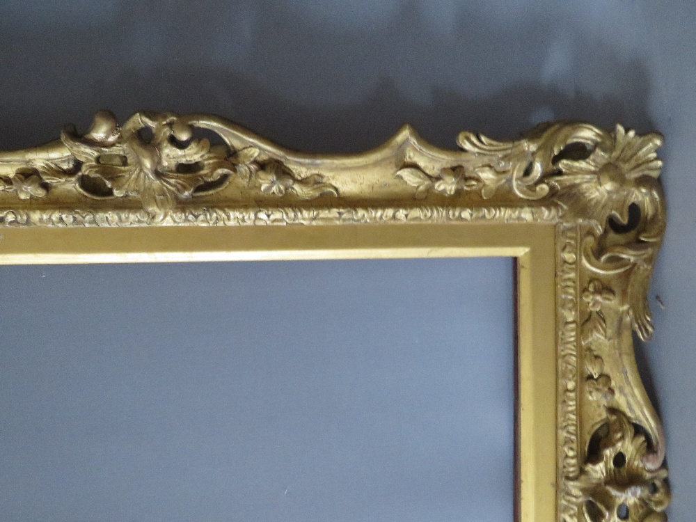 A 19TH CENTURY CARVED WOODEN GILT SWEPT AND PIERCED FRAME, with integral slip, frame W 7.5 cm, - Image 3 of 6