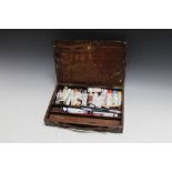 A MAHOGANY ARTISTS BOX, with leather carry handle, W 33.5 cm