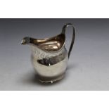A HALLMARKED SILVER CREAM JUG - LONDON 1803, makers mark indistinct but very probably that of Peter,