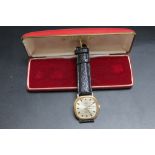 A ROTARY 9 CARAT GOLD AUTOMATIC 21 JEWEL DAY DATE WRIST WATCH, on replacement strap, Rotary box, W