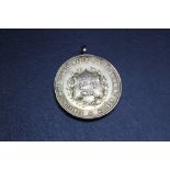 A HALLMARKED 9 CARAT GOLD STAFFORDSHIRE COUNTY WATER POLO AND SWIMMING ASSOCIATION MEDAL BY C