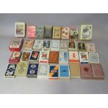 A SELECTION OF VINTAGE PLAYING CARDS AND GAMING CARDS