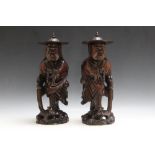 A PAIR OF CHINESE HARDWOOD CARVED FIGURES, with detachable hats, H 42 cmCondition Report:notable
