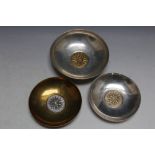 THREE UNUSUAL 925 STAMPED DISHES, with central sun ray style image, not all constituent parts