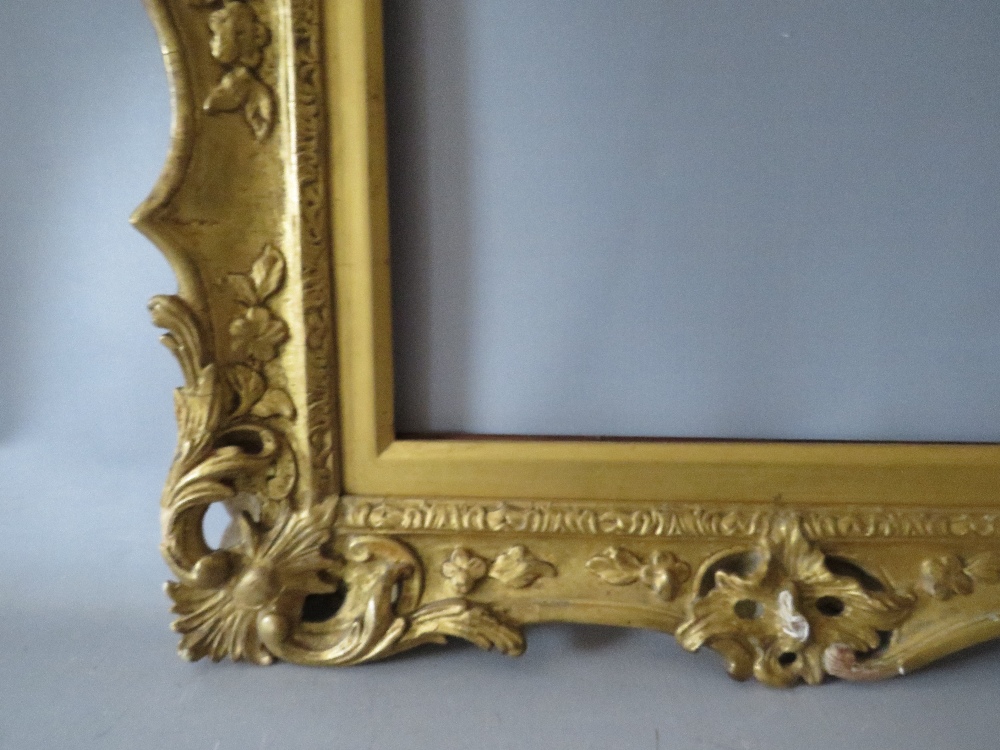 A 19TH CENTURY CARVED WOODEN GILT SWEPT AND PIERCED FRAME, with integral slip, frame W 7.5 cm, - Image 4 of 6